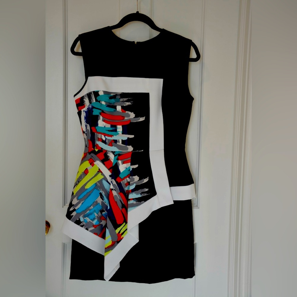 BCBG dress- asymmetric peplum at waist.